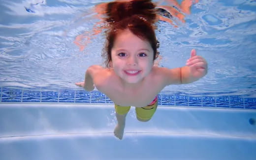 a child in a pool