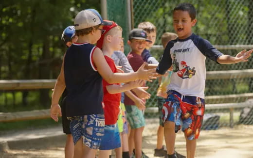 a group of kids playing outside