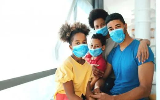 a group of people wearing face masks