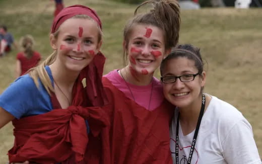 a group of women smiling