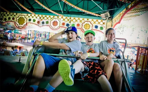 a group of people on a roller coaster
