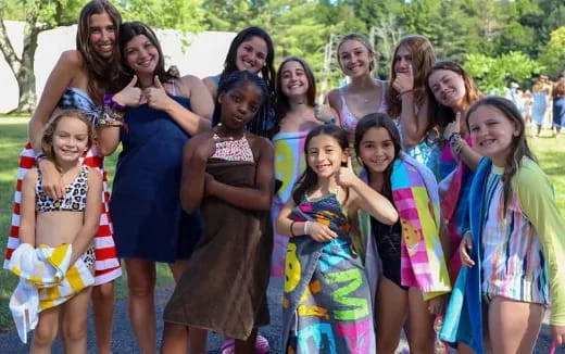 a group of women posing for a photo