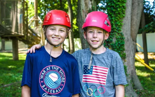 two boys wearing helmets