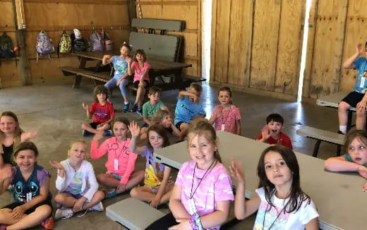 a group of children sitting on the floor