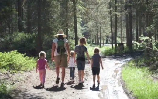 a man walking with children