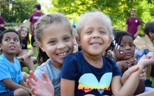 a group of children smiling