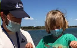 a man and a woman on a boat