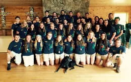 a group of people posing for a photo