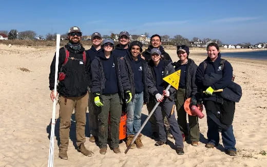 a group of people posing for a photo