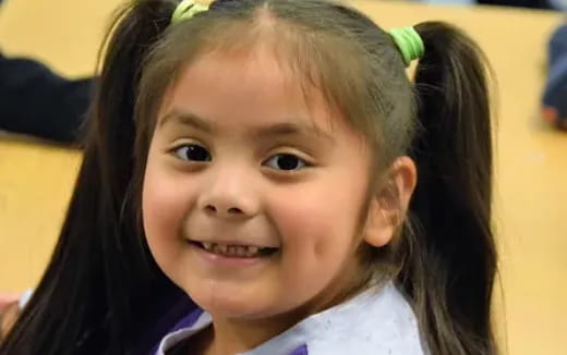 a close up of a girl