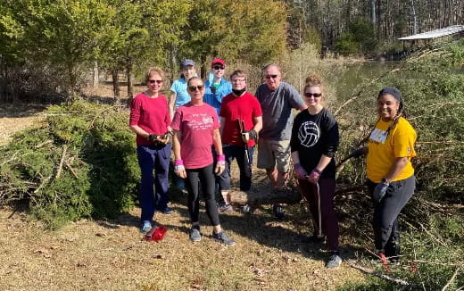 a group of people posing for a photo