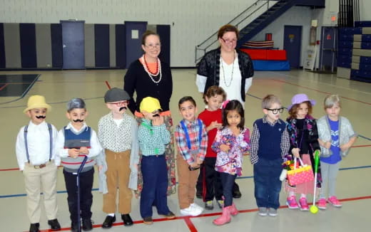 a group of children posing for a photo