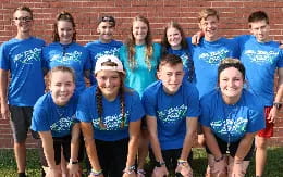 a group of people posing for a photo