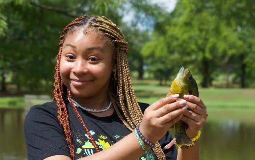 a person holding a bird