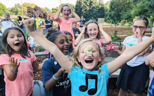 a group of people posing for a photo