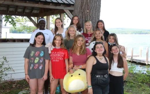 a group of people posing for a photo