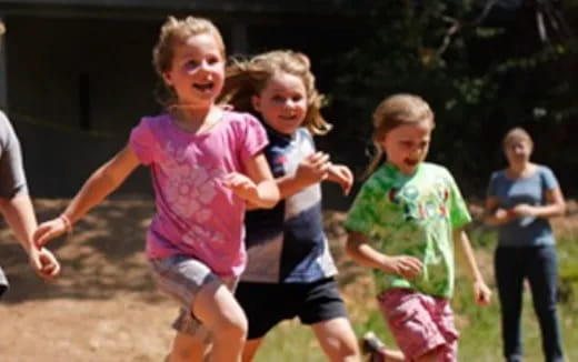 a group of children running