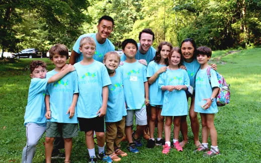a group of people posing for a photo