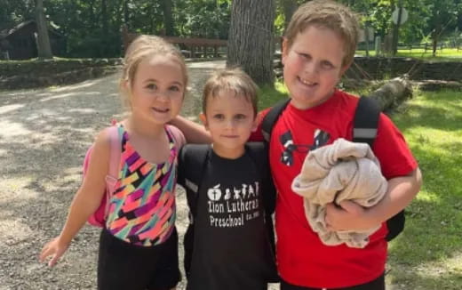 a group of children posing for a photo