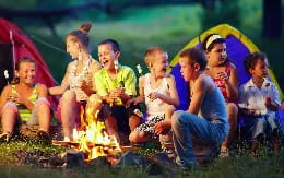 a group of people sitting on the ground
