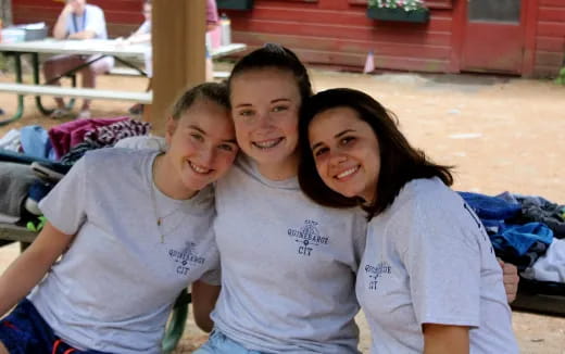 a group of people posing for the camera