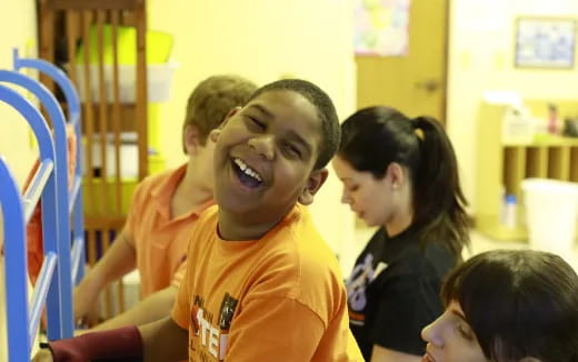 a group of children in a classroom