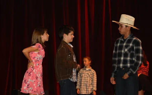 a group of people on a stage