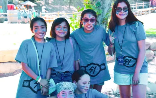 a group of people posing for a photo