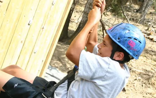 a boy wearing a helmet