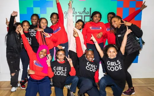 a group of people posing for a photo