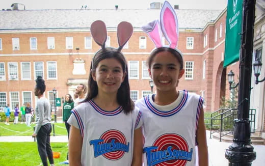 a couple of girls wearing bunny ears