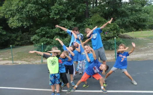 a group of people jumping in the air