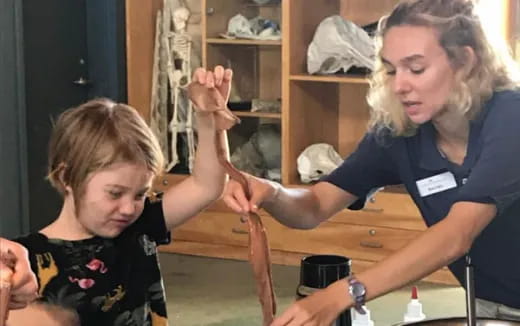 a person and a boy painting