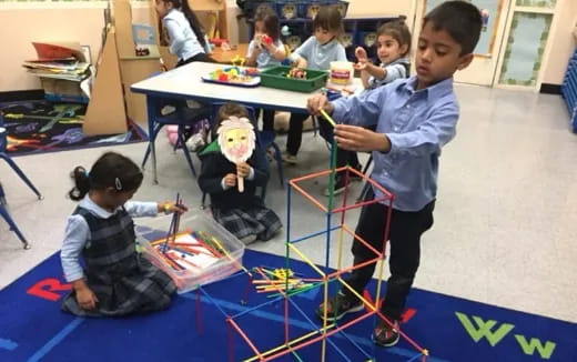 a group of children playing with toys