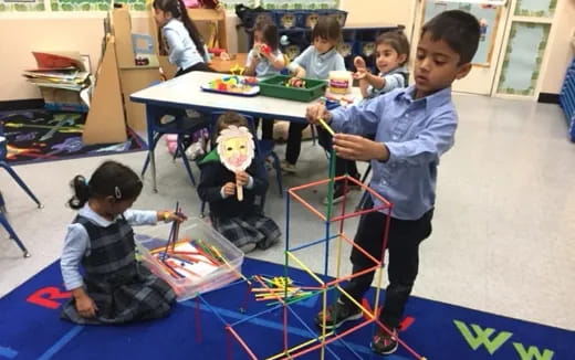 a group of children playing with toys