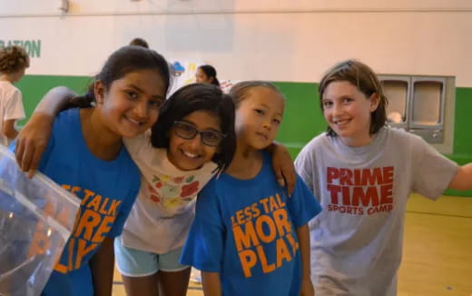 a group of girls posing for a photo
