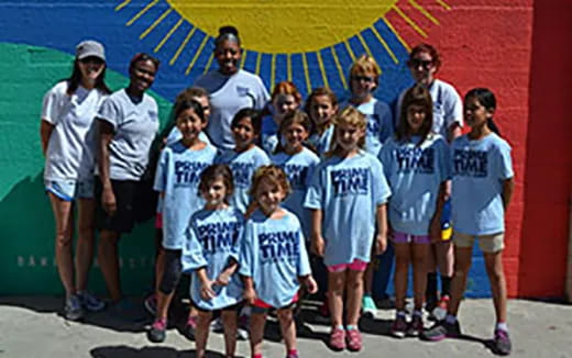 a group of people posing for a photo