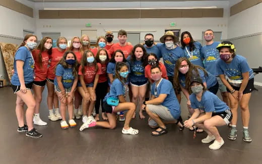 a group of people posing for a photo