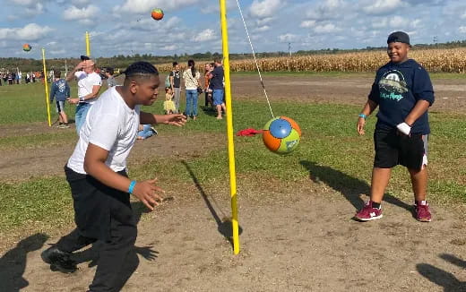 a group of people playing football
