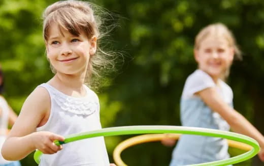 a couple of girls smiling