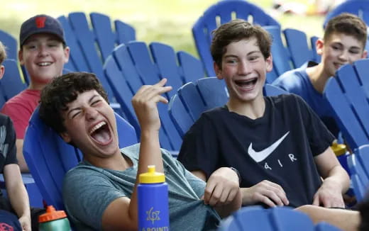 a group of people sitting in chairs