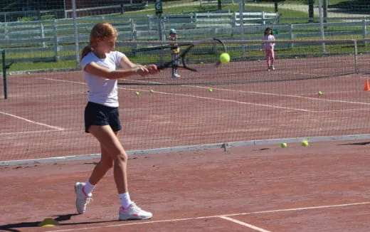 a person playing tennis