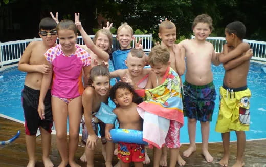 a group of children posing for a photo
