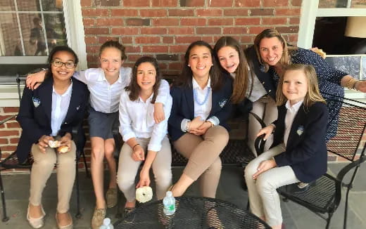 a group of people sitting on a couch