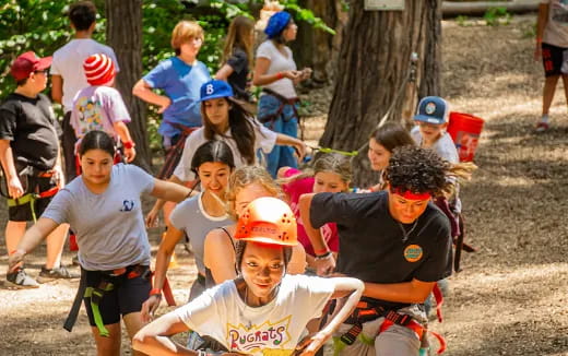 a group of kids playing in the dirt