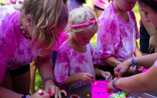 a group of people playing with toys