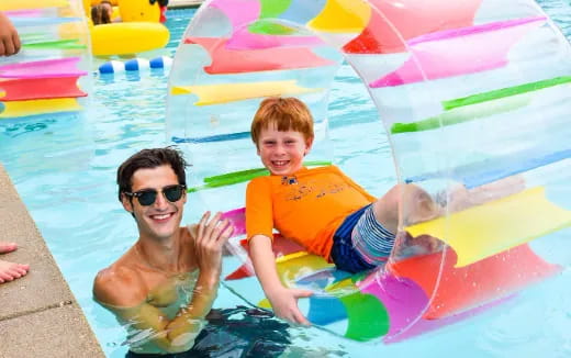 two boys in a pool