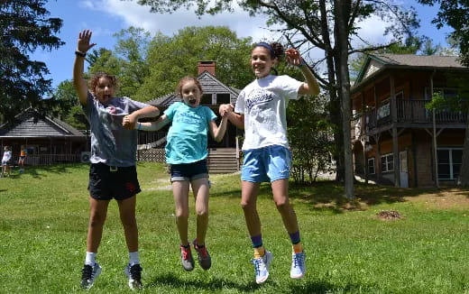 a group of people jumping in the air