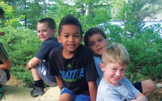 a group of boys posing for a picture
