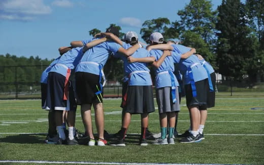 a group of people huddled together